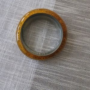 Vintage Retro honey gold Lucite flying saucer bangle bracelet